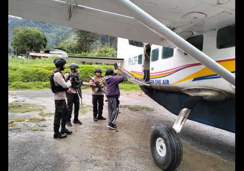 Pesawat Asia One Ditembaki OTK